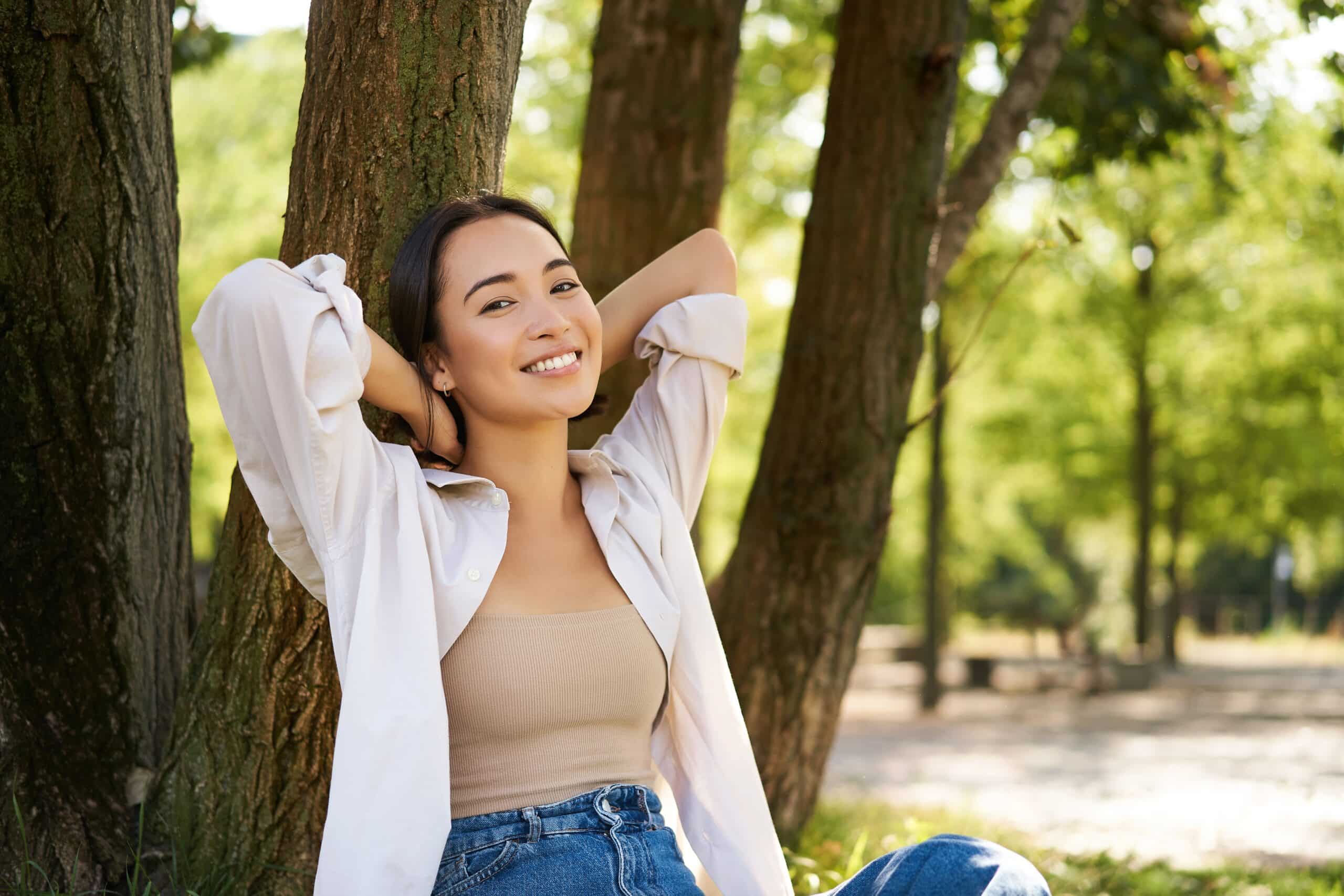 Portrait,Of,Beautiful,Asian,Woman,Resting,Near,Tree,,Relaxing,In