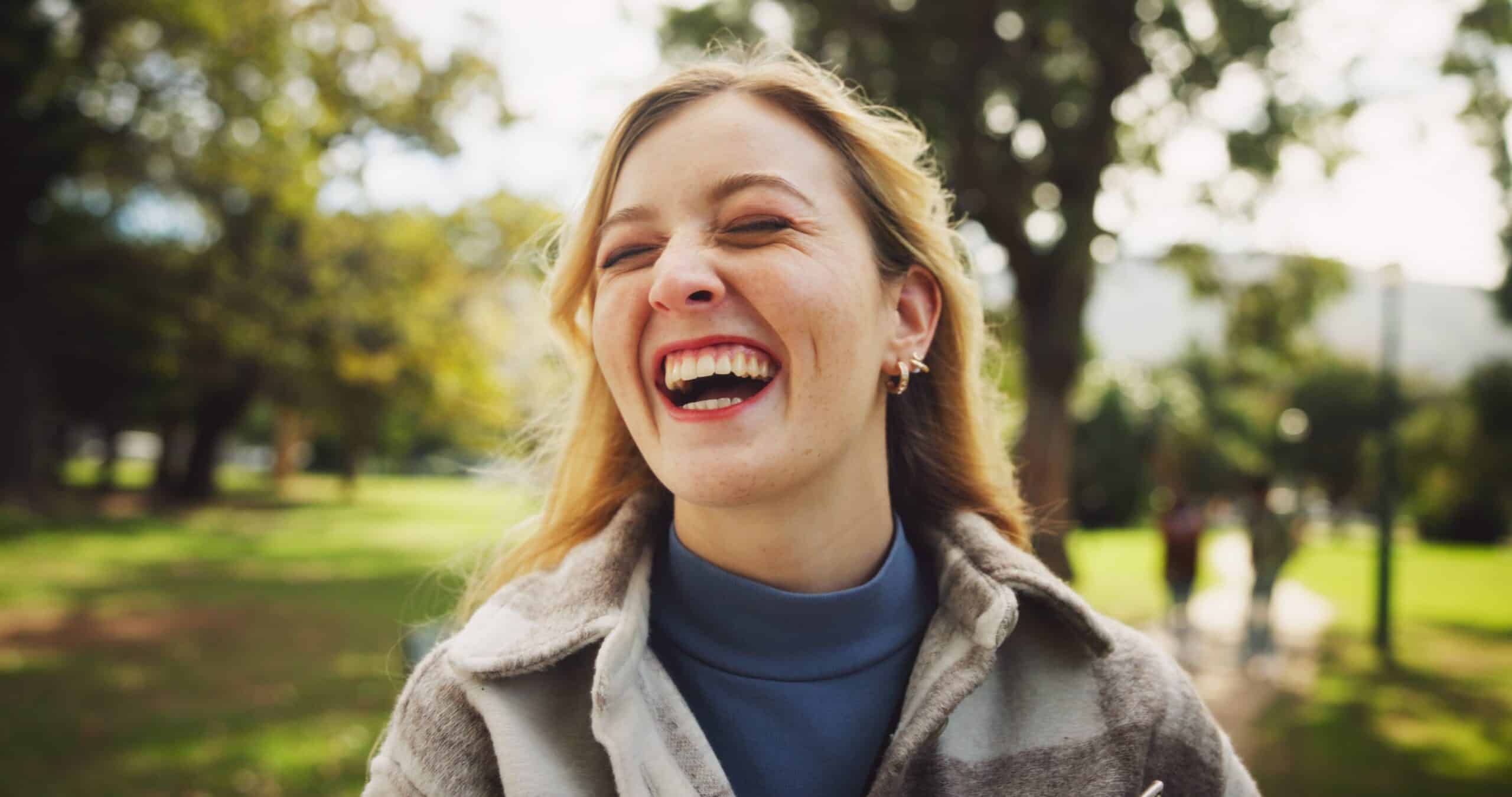 Female,Student,,Happy,And,Laughing,In,Park,For,Study,Opportunity,