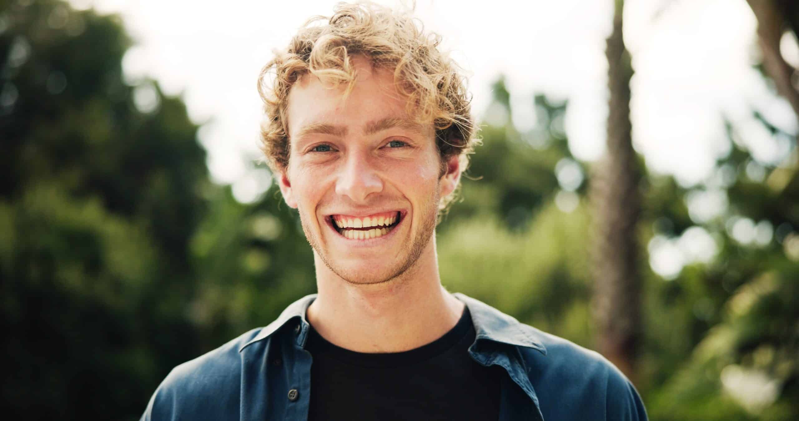 Portrait,,Happy,Man,And,College,Student,In,Park,On,Campus