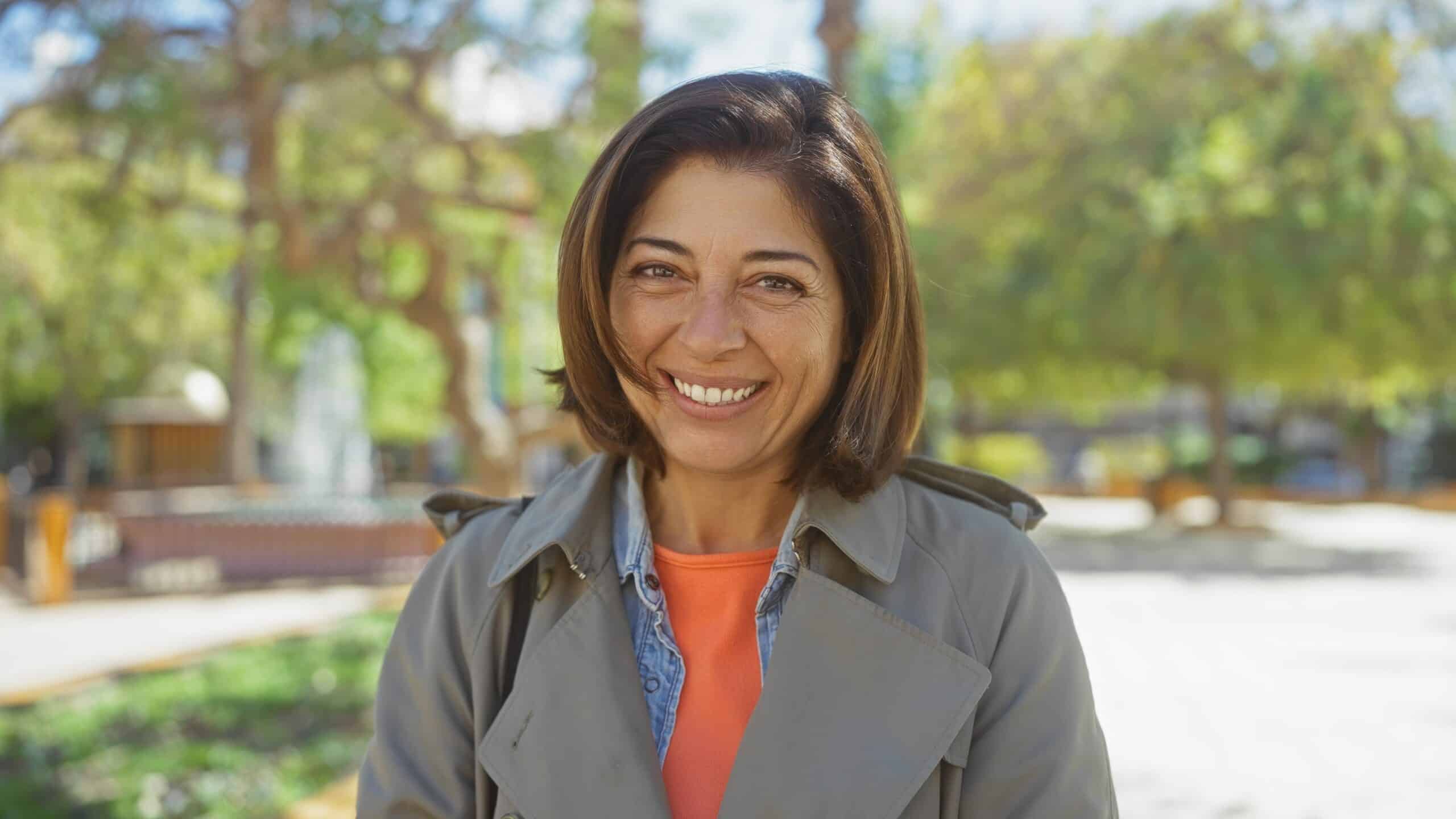 Smiling,Hispanic,Woman,Enjoying,A,Sunny,Park,Setting,Outdoors