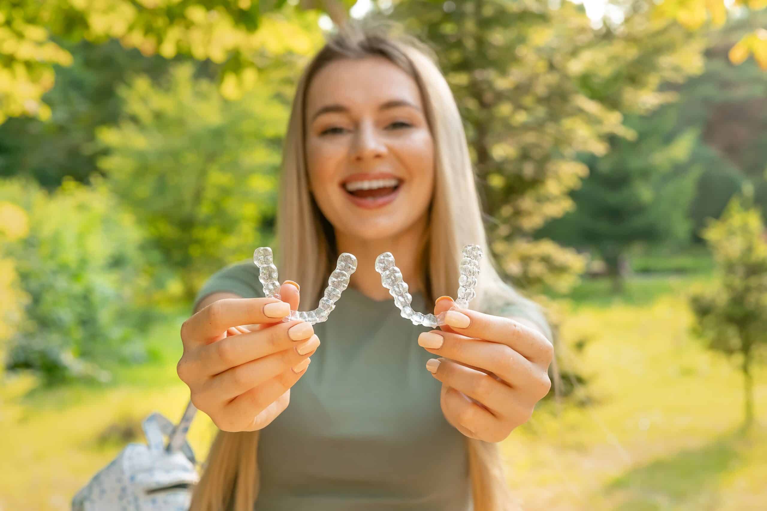 Women,Hands,Hold,Inivisalign,Braces,,Transparent,Aligner,,Invisible,Retainer,Or